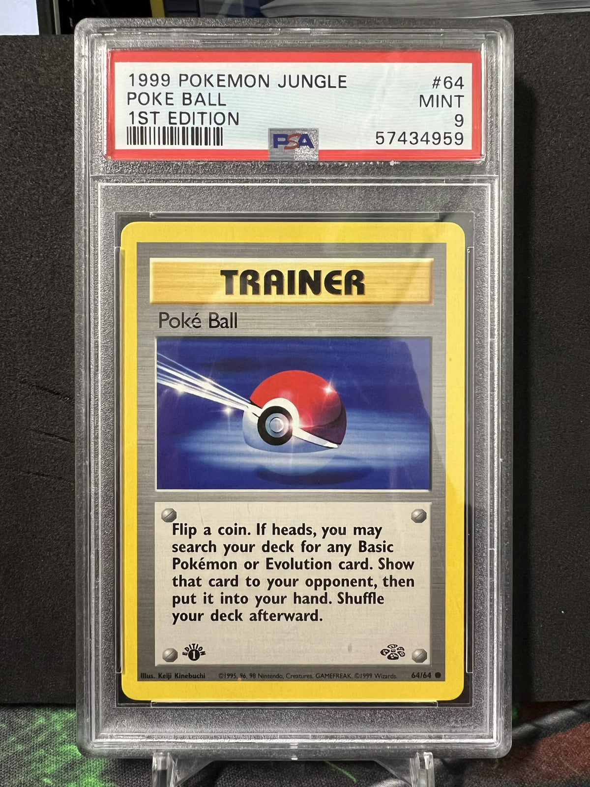 Pokemon 1999 Poke Ball 64/64 1st Edition Jungle PSA 9